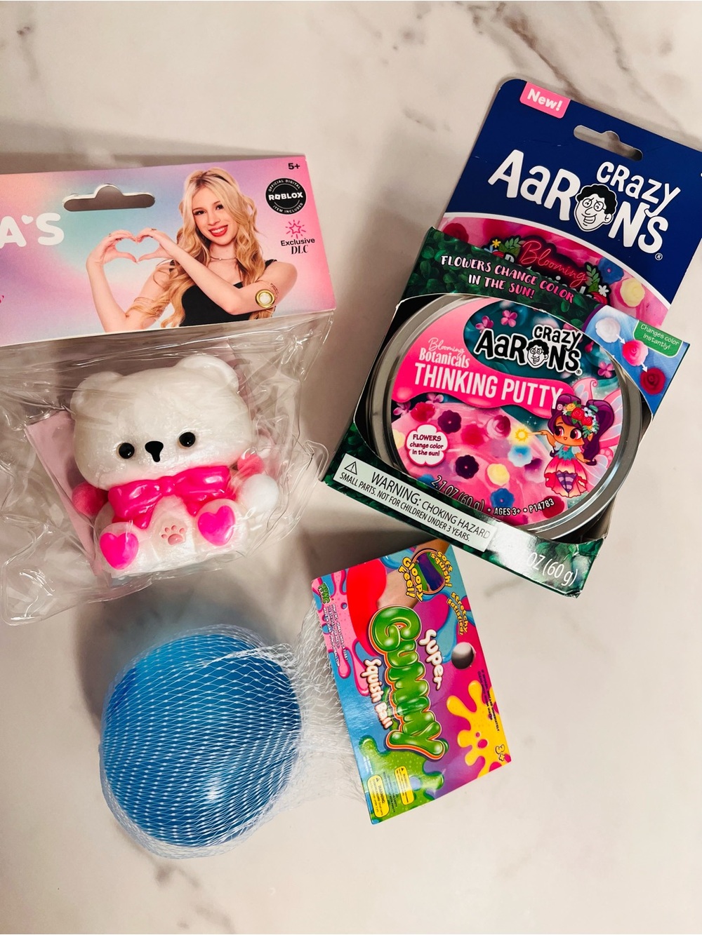 Crazy Aaron’s Blooming Botanicals, Gummy Squish Ball, Lana’s Life Teddy Roblox